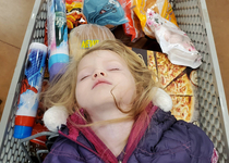 My daughter fell asleep in the cart at the grocery store last night and she totally looked like a fallen viking warrior being sent out to sea