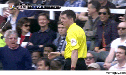 A blind fan offers something to the referee