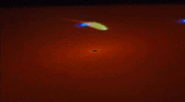 A gas cloud  being swallowed by a super massive black hole at the center of our Milky Way