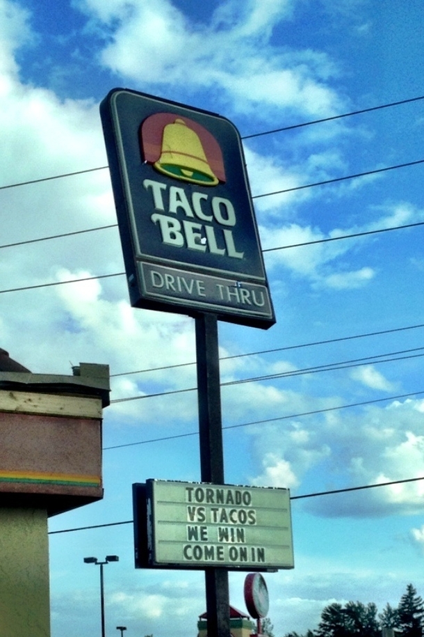 After a local Taco Bell was hit by a tornado They decided a broken sign and some roof damage was no match for them 