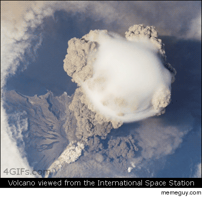 Astronaut view of an erupting volcano