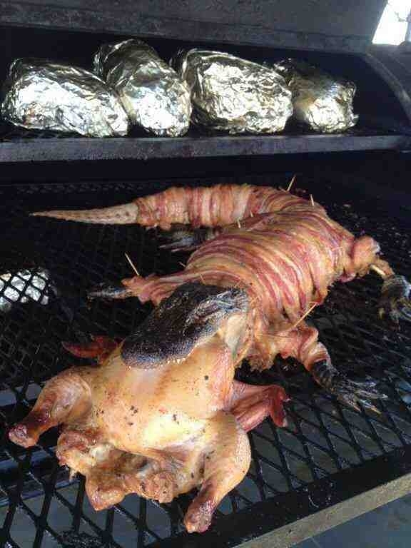 Bacon wrapped alligator with stuffed chicken anybody