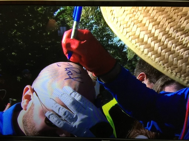 Bill Murray just autographed a bald fans head with Jay Z