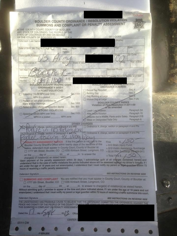 Blackhawk pilot must park on a street in Colorado to help in a rescue from the floods gets this amusing ticket from local police in return more in comments xpost from rMilitary amp rpics