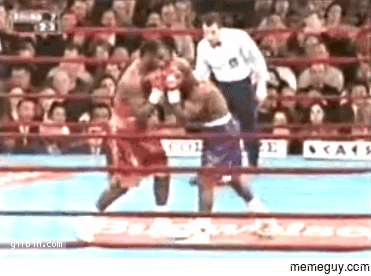Boxing referee shows impressive move dodging punch