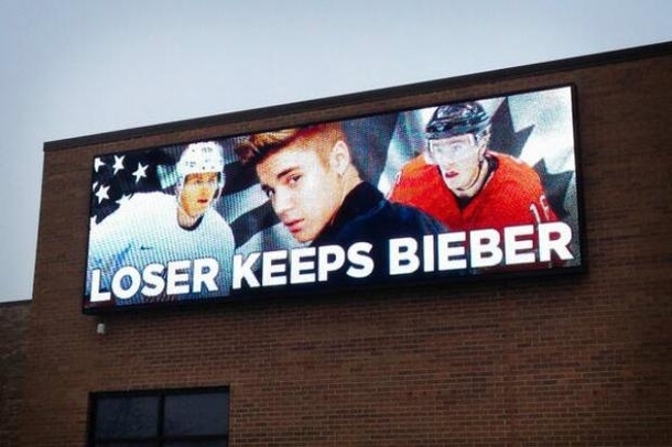 Canada VS USA hockey game tomorrow This is a billboard in Chicago