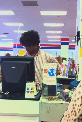 Cashier at the thrift store looks like Moss from The IT Crowd