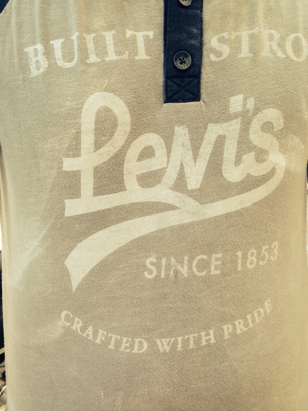 Coworkers shirt looks like it says something besides Levis