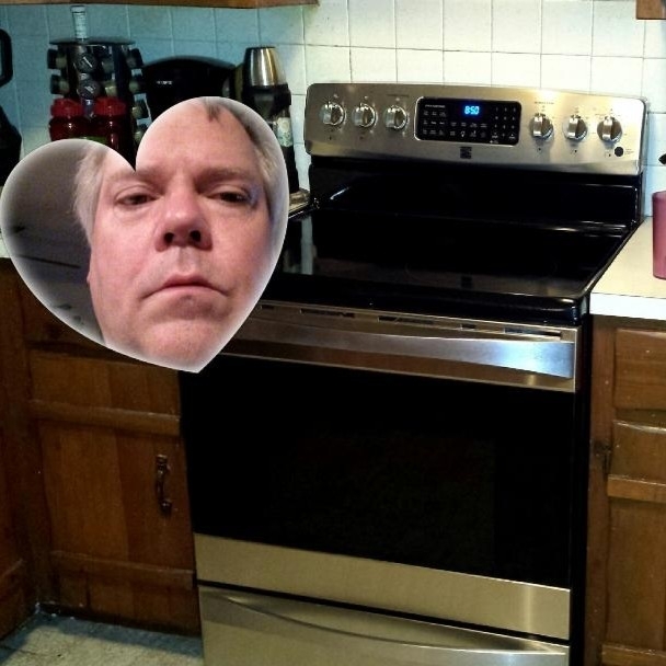 Dad sends pic of his new stove forgets to turn off the front cam heart feature