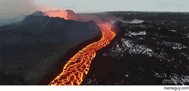 Drone footage of a flowing lava river