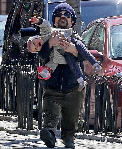 feeling sad Here is a picture of Peter Dinklage holding his baby