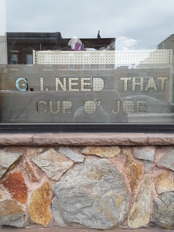 Found this while traveling It is in the window of an army surplus store connected to a coffee shop