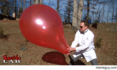 Giant balloon popping in slow motion
