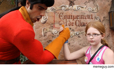 Girl at Disneyworld challenges Gaston to an arm wresting contest