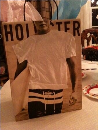 Grandma sent me some Hollister but didnt like the shirtless man on the bag so she sewed a shirt onto him