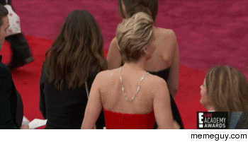 heres your mandatory annual jennifer lawrence tripping on something at the oscars gif