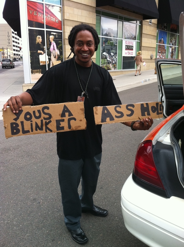 I asked my Jamaican Taxi Driver in Denver what the signs in his trunk were for