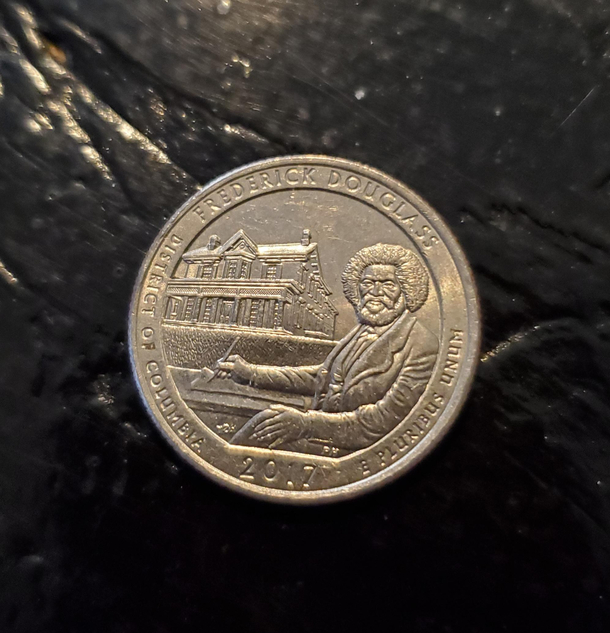 I pulled this out of my pocket and thought for a split second Bob Ross was on a quarter