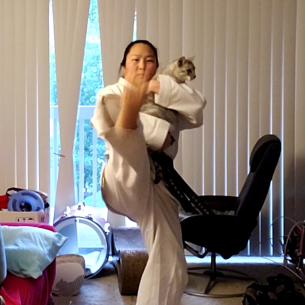 I wanted to do kicking practice Cat wanted to be held Here is our compromise