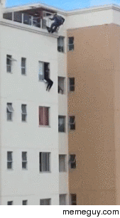 Man preparing to jump off building is kicked back into window