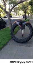 Man uses  pound tire as a hula hoop