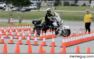 Motorcycle cop on obstacle course
