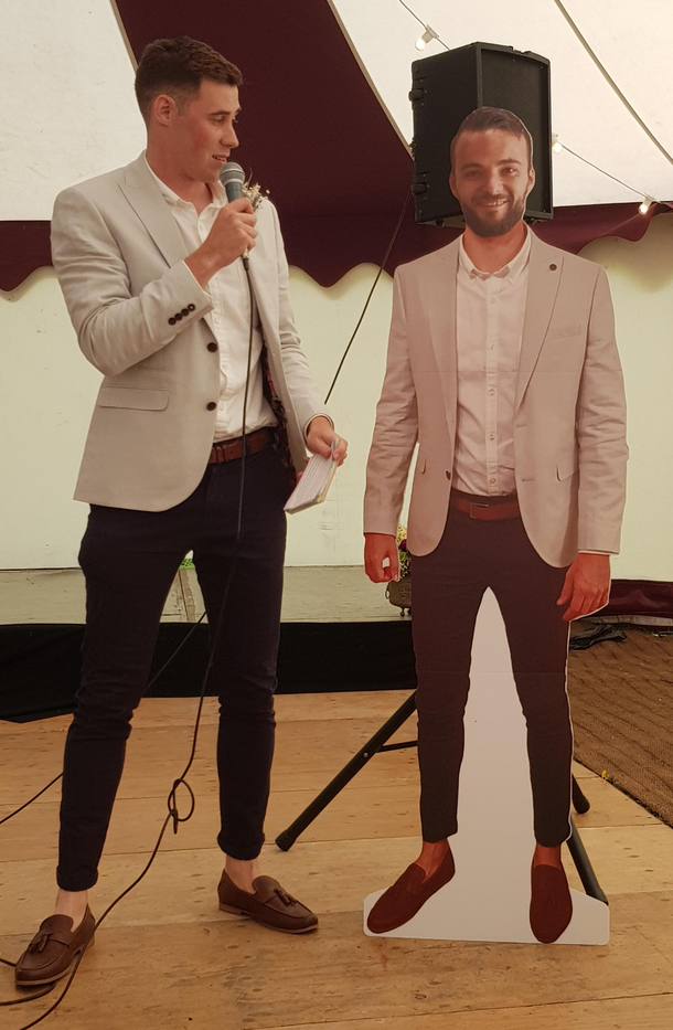 My brothers best friend is driving to Mongolia for charity so they brought a cardboard cutout of him to the wedding reception