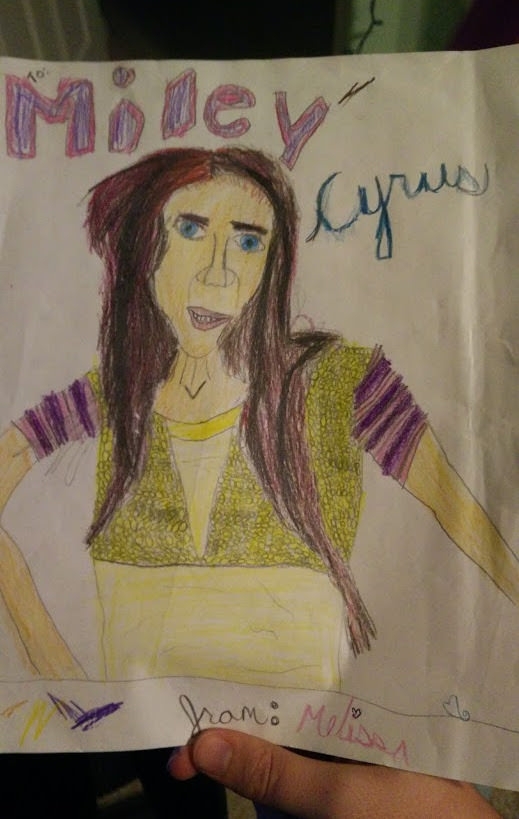 My sisters attempt at drawing Miley Cyrus somehow ended up as Nicholas Cage