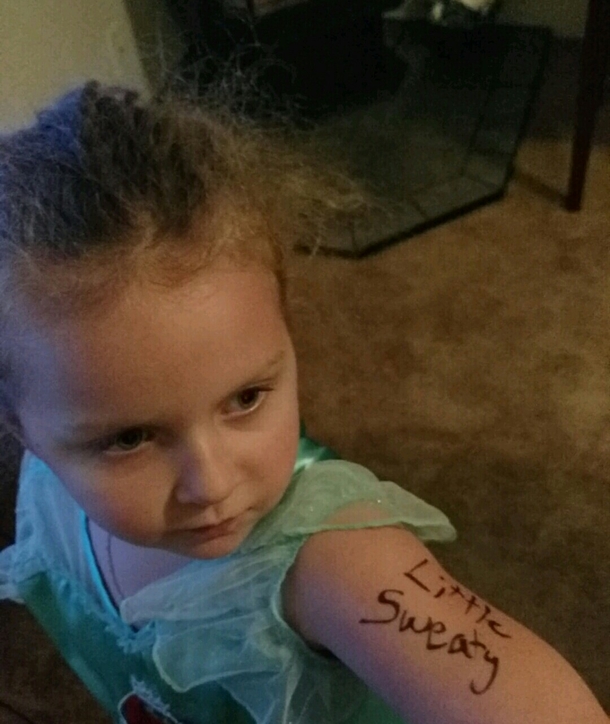 My son tried to write Little Sweetie on my daughters arm Spelling is not his strong suit