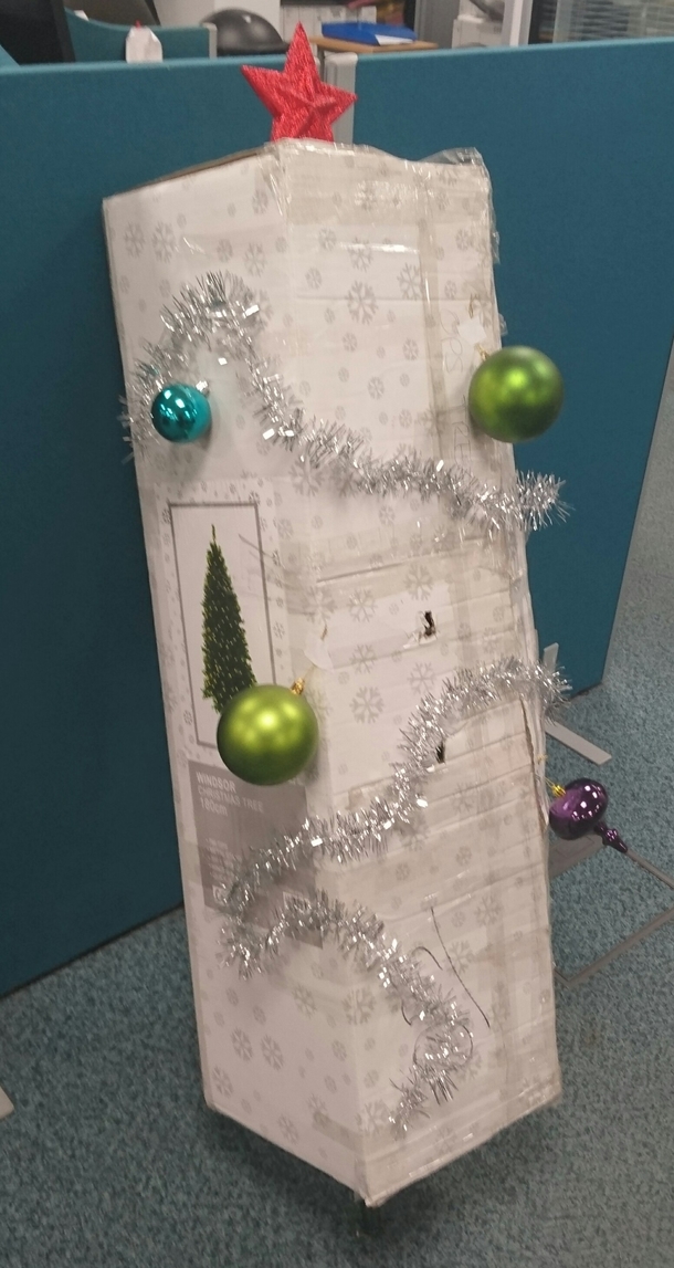 No one at work has taken responsibility for decorating the Christmas tree for the last week it has been propped up in its box waiting Today I stepped up to the plate