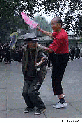 Old Chinese men dancing