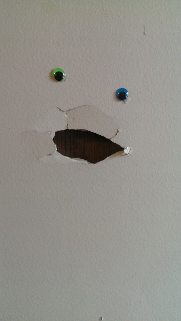 One of my employees accidentally smashed a hole in our wall I decided to improve it