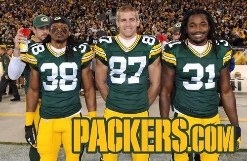 Pic #1 - Before every game the Green Bay Packers take a picture of the captains And Aaron Rodgers Photobombs every single one
