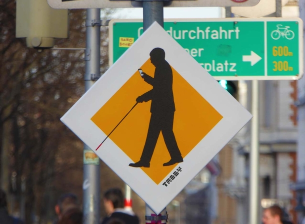 Pic #1 - Street signs warning of technically blind pedestrians