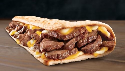 Pic #1 - Taco Bells Triple Steak Stack Ad versus what it actually looks like