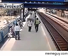 Police Officer Saves Suicidal Man From Train At Last Second