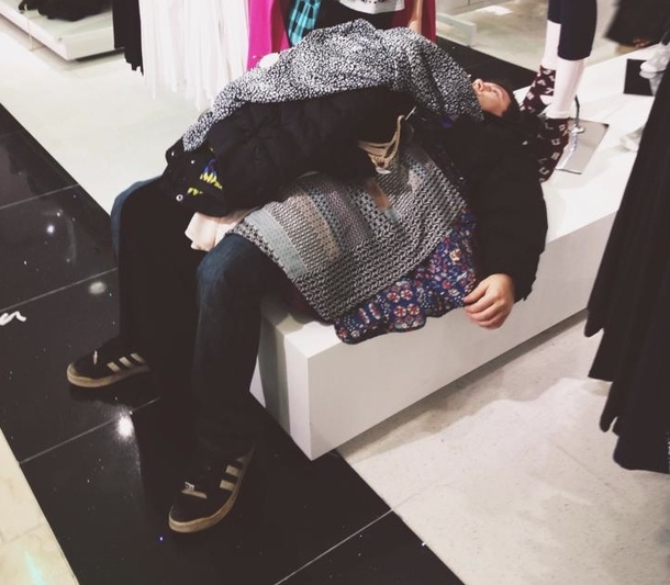Poor guy was shopping with three girls family from the looks of it He laid down for a second and they just left him like this They shopped he dropped