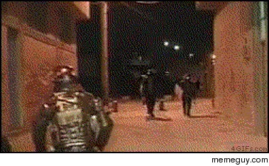 Riot police close ranged contact 