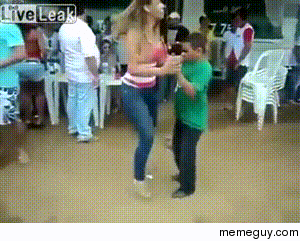 Small guy dances with women