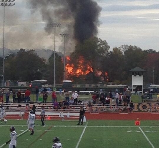 So I was watching my little brother play football when the house behind the field caught fire The game didnt even get delayed