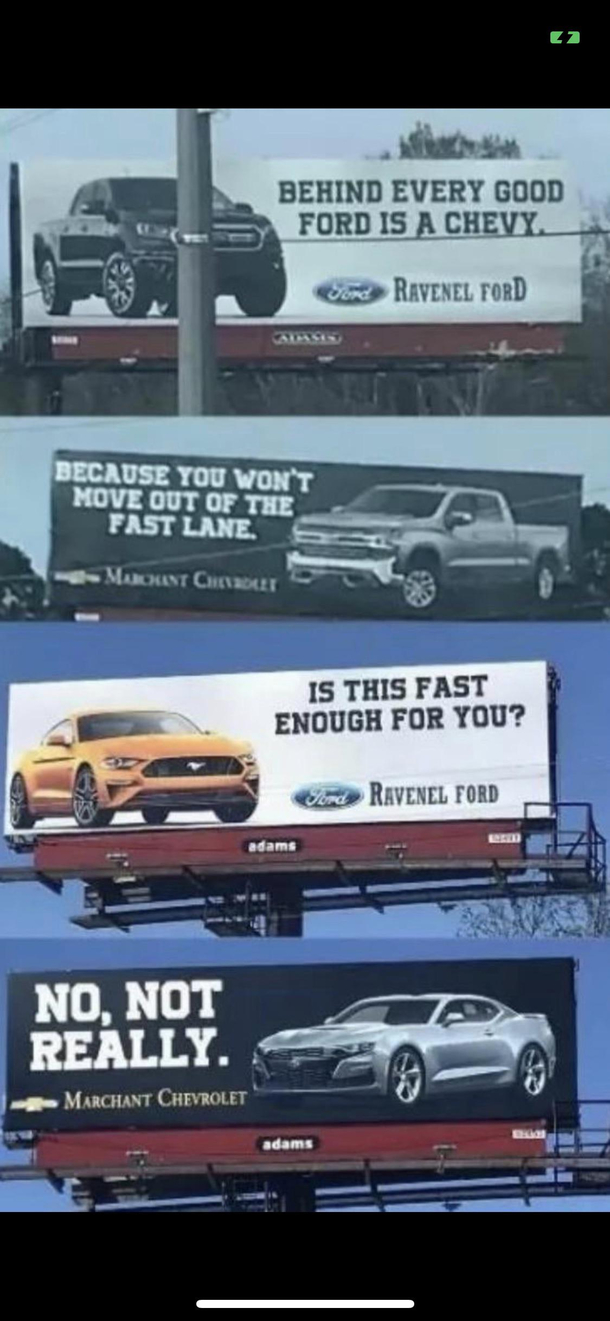 Some serious competition between two car dealerships