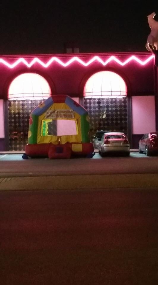 Speaking of bounce houses in strange places heres one I spotted at a strip club in Memphisat pm