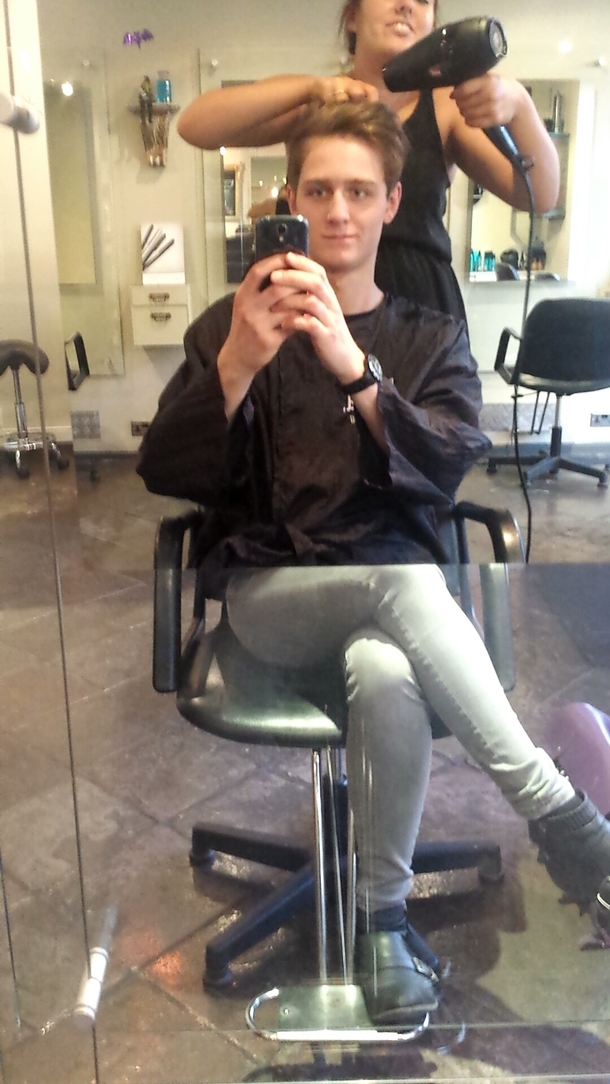 The bottom half of the mirror at the hairdressers is glass It confused me for a second when someone sat on the other side