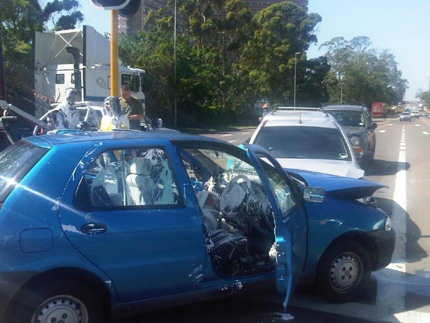 The people in the blue car had a -litre bucket of paint on the back seat Story in comment