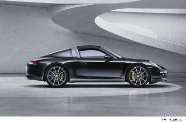 The Porsche  Targa opening its roof