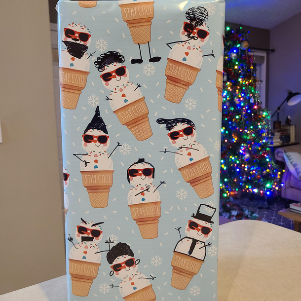 the wrapping paper was boring so i turned the snowpeople into lil characters
