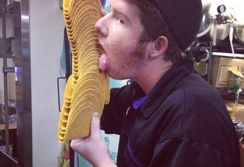 This kid in my town licked a stack of taco shells at the Taco Bell he worked at and put a pic on Facebook Now its worldwide news