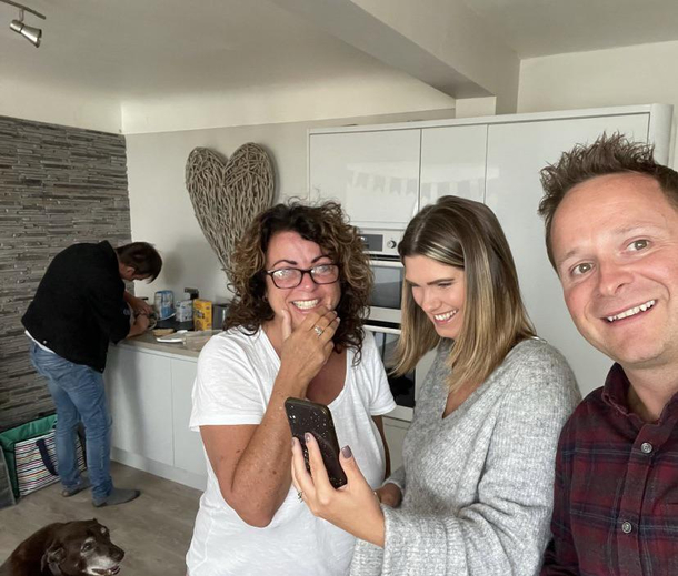 This was taken this morning when everyone found out my sister is pregnant My mum is the one crying my sister is the one smiling my brother in-law was the one taking selfie and thats me making Jam sandwiches in the back