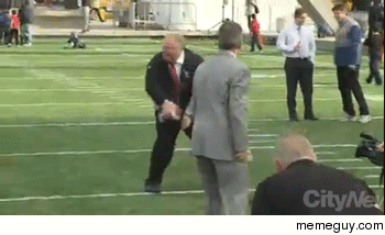 Toronto Mayor Rob Ford attempts throwing a football