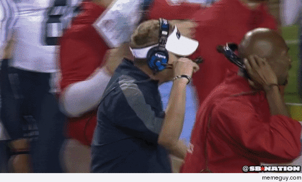 Two football coaches at Ole Miss in bizarre synchronization